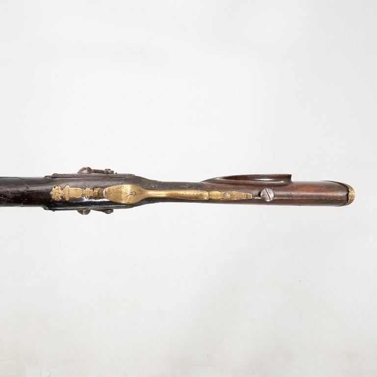 A double barreled percussion gun, 19th century.