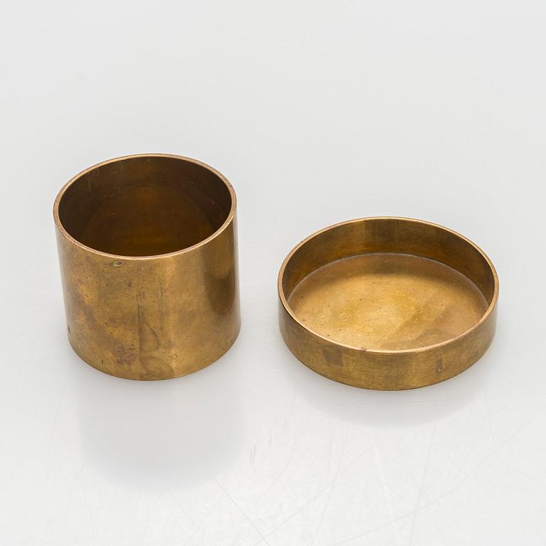 Maija Heikinheimo, a set of two mid-20th century brass jars, manufacturer Valaistustyö for Artek.
