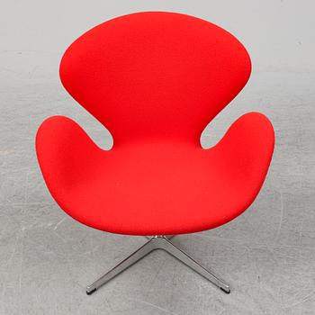 ARNE JACOBSEN, a 'Swan' lounge chair from Fritz Hansen.