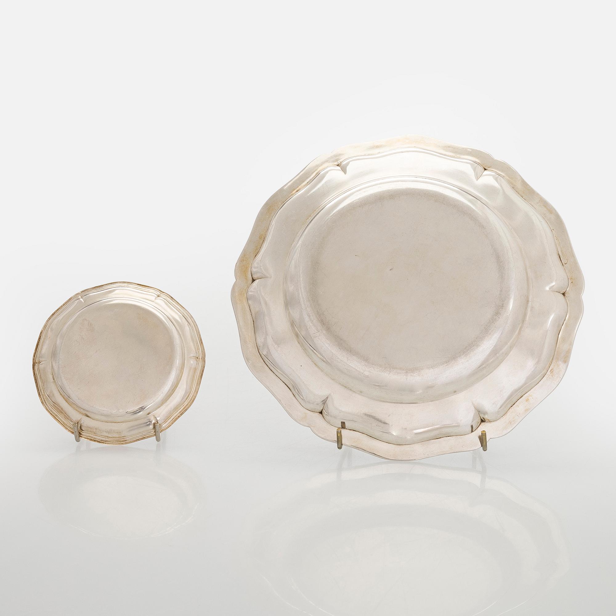 A silver serving platter, and six similar coasters, Austria-Hungary 1867-1922 and Czechoslovakia 1949-1962.
