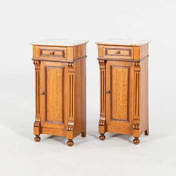 A pair of Neo Renaissance  bedside tables.