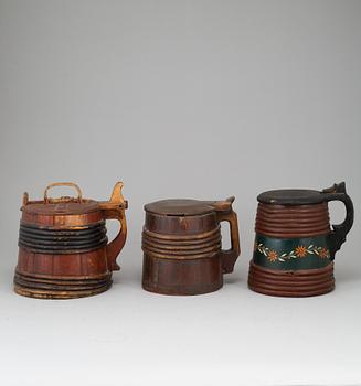 Three painted wooden jars from the 19-20th century.