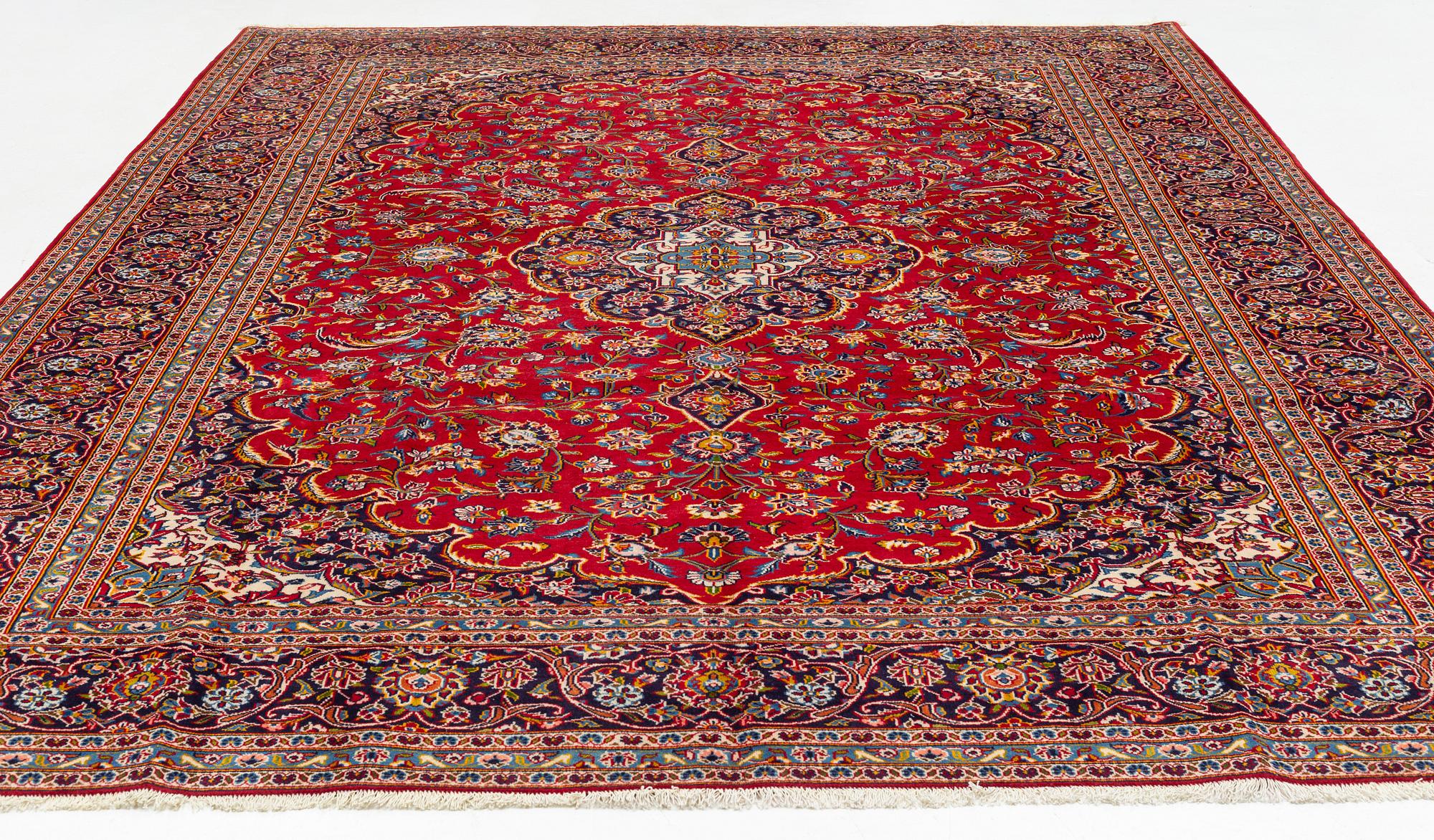 A Keshan carpet, approximately 408 x 287 cm.