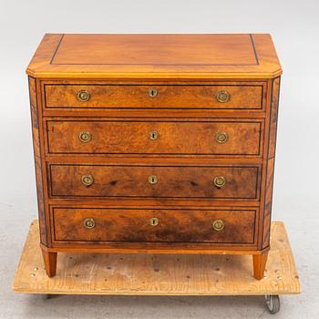 A chest of drawers, circa 1900.