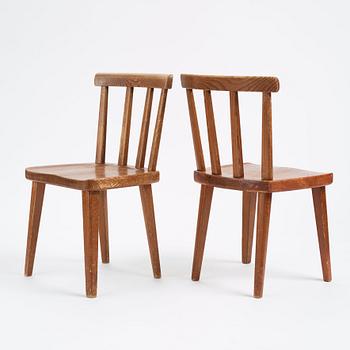 Axel Einar Hjorth, a set of four 'Utö' pine chairs, Nordiska Kompaniet, Sweden 1930s.