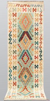 A Kilim runner, approx. 294 x 91 cm.