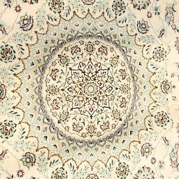 A carpet, Nain, part silk s.k 9LAA. Circa 376 x 249 cm.