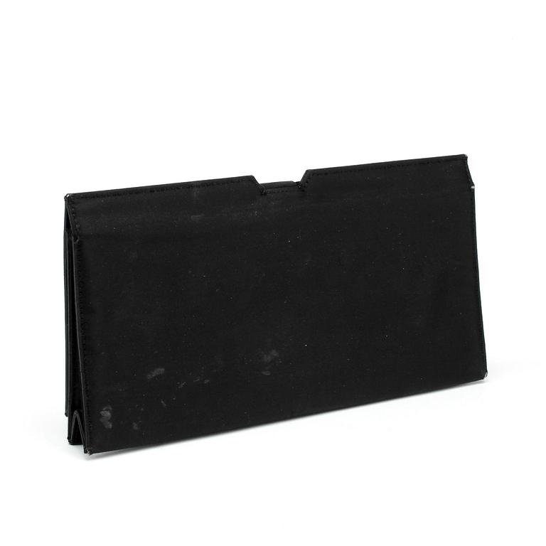 CHRISTIAN DIOR, a black silk evening bag / clutch.