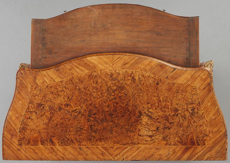 A burr-alder and gilt brass-mounted rococo commode by J. Sjölin (master 1767-1785).
