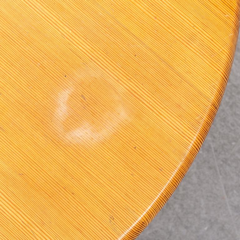 A Swedish 1960s pinewood round sofa table, design CARL MALMSTEN.