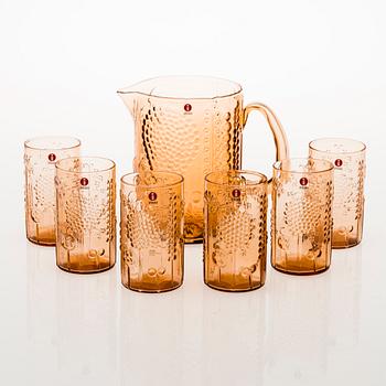 OIVA TOIKKA, A 'Flora' glass pitcher with a set of six 'Flora' tumblers. Model designed in 1966.