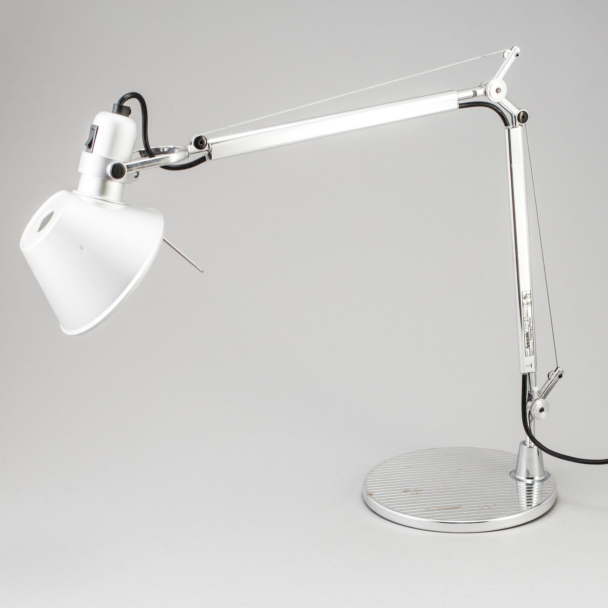 A "Tolomeo" desk light by Artemide Italy.