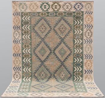 A Kilim rug, approx. 290 x 195 cm.