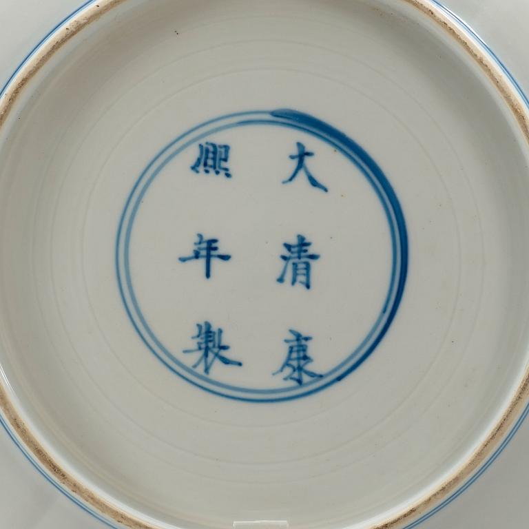 A pair of blue and white dishes, Qing dynasty, with Kangxi six character mark and period (1662-1722).