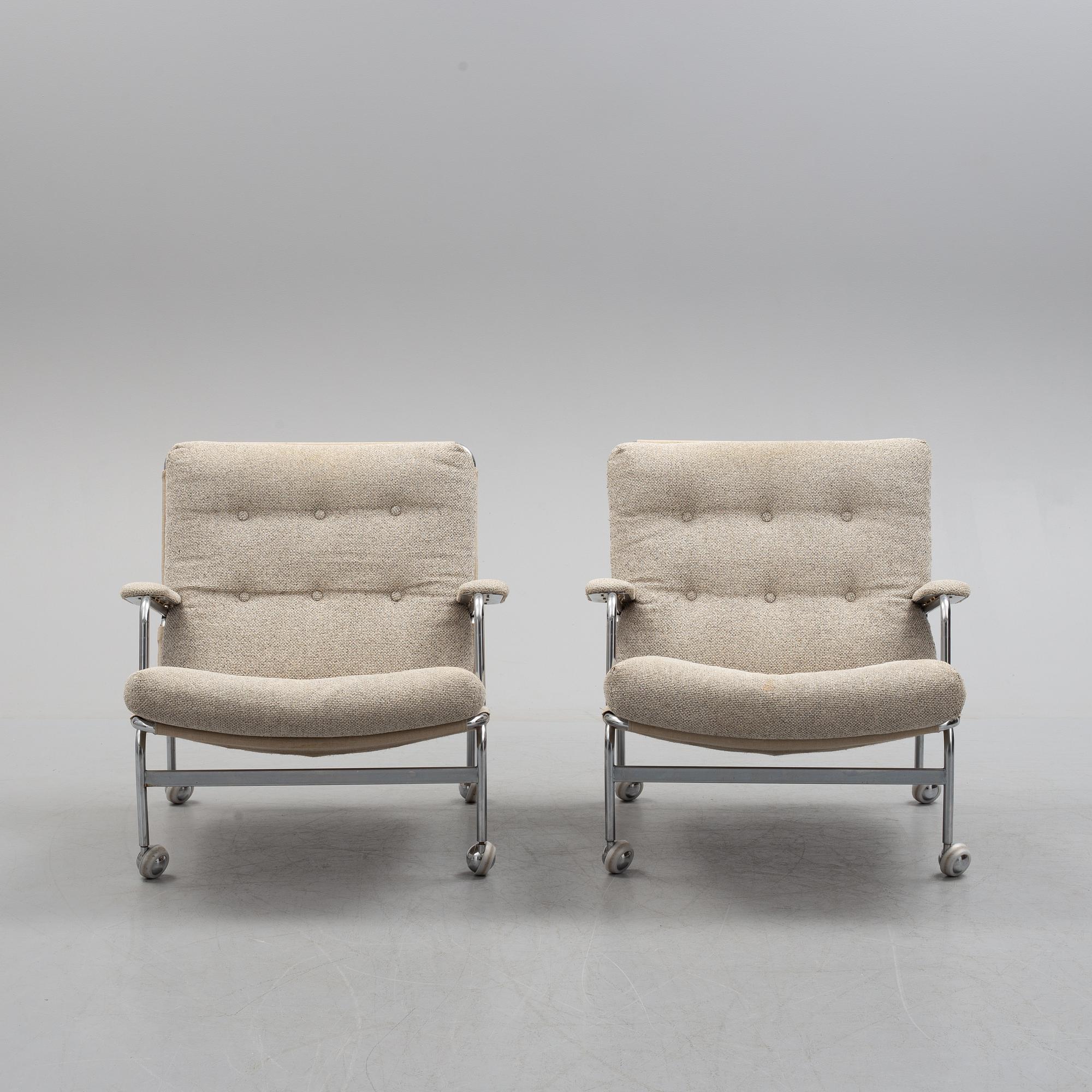A pair of 'Karin' easy chairs by Bruno Mathsson for Dux, second half of the 20th century.
