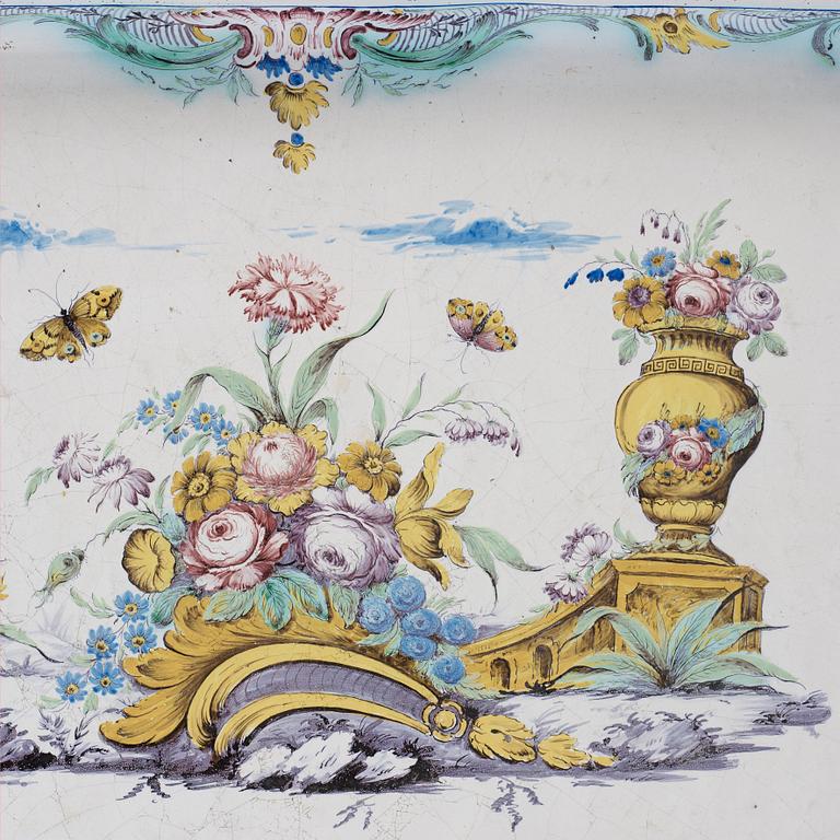 A Swedish Rococo faience tea table by Rörstrand 1771.