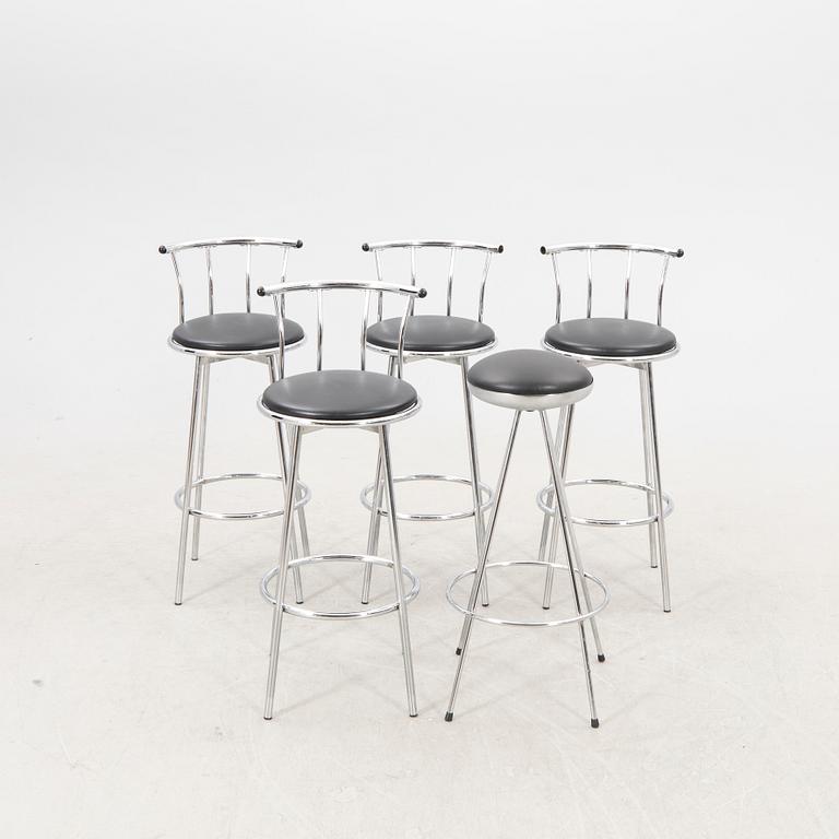 A set of four plus one bar stools Johansson desing later part of the 20th century.