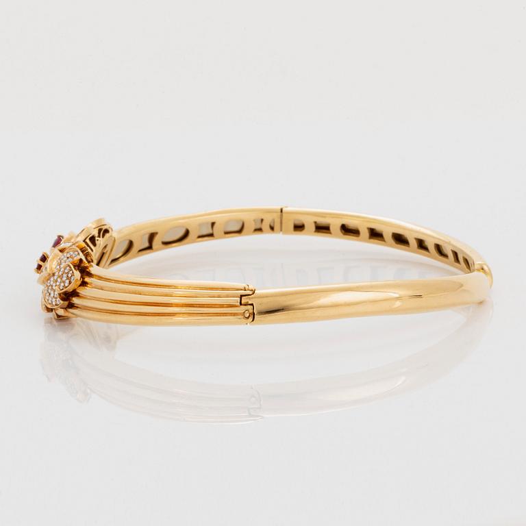 Collier och armband 18K guld med fasettslipade rubiner.