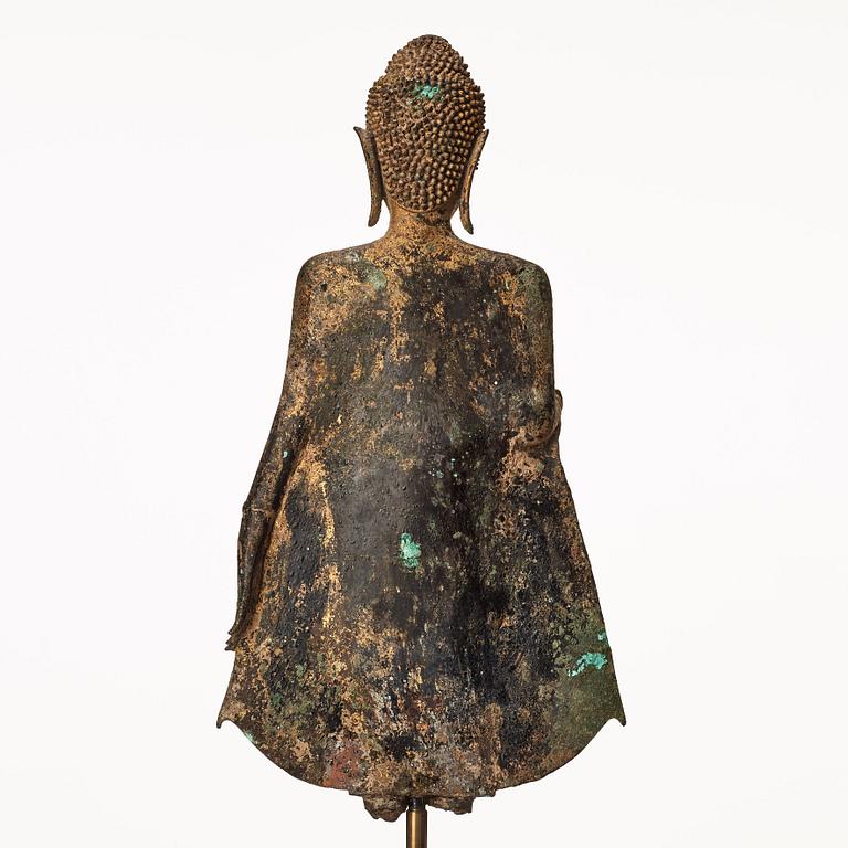A standing figure of Buddha, Thailand, 18th Century.