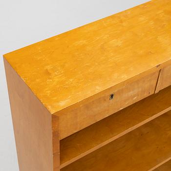 A bookcase, 1930s.