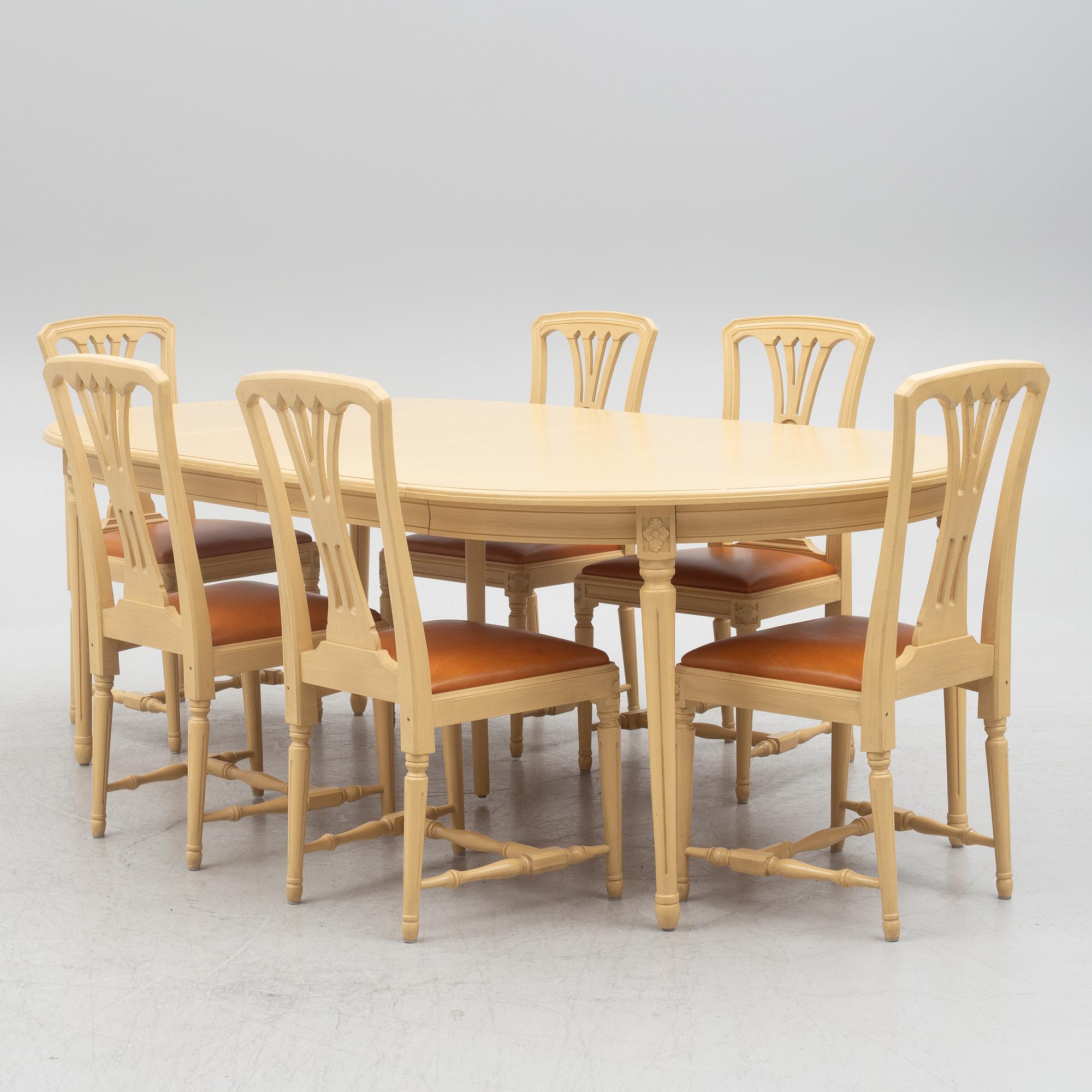 A Gustavian style dining table with six dining chairs, Sweden, 21st century.