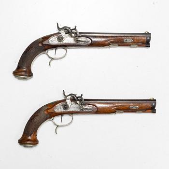 A pair of percussion pistols, Germany, Signed V Chr Schilling in Suhl (Valentin Christoph S. active from 1849).