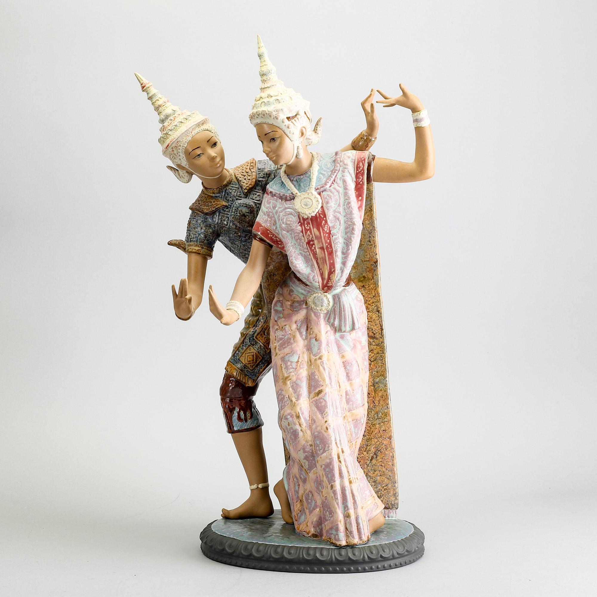 A Lladro stone ware figurine.