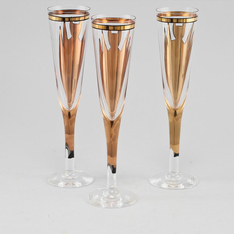 CHAMPAGNESTRUTAR, 3 st, glas, "Goldie", Ulrica Hydman Vallien, Kosta Boda, 1900-talets andra hälft.