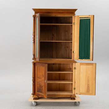 A book cabinet, around the year 1900.