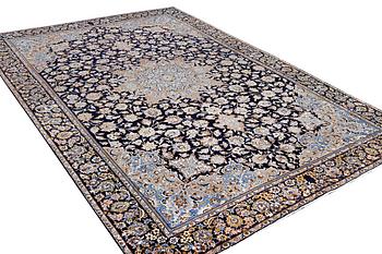 A Kashan carpet, c. 430 x 293 cm.