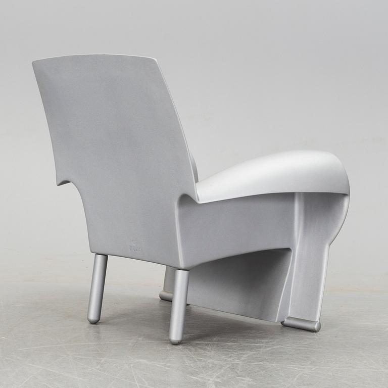 an easy chair "Richard III" by Philippe Starck.