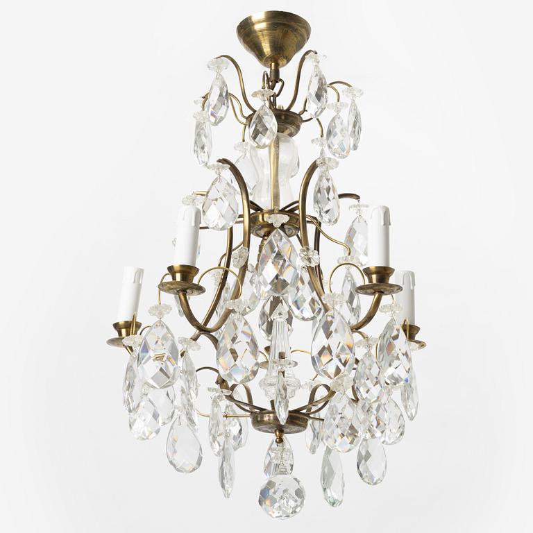 Takkrona, barockstil, 1900-talets första hälft.