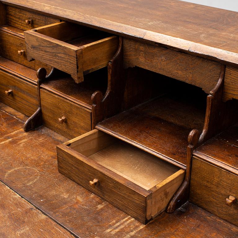 A mid 18th century oak secretaire.