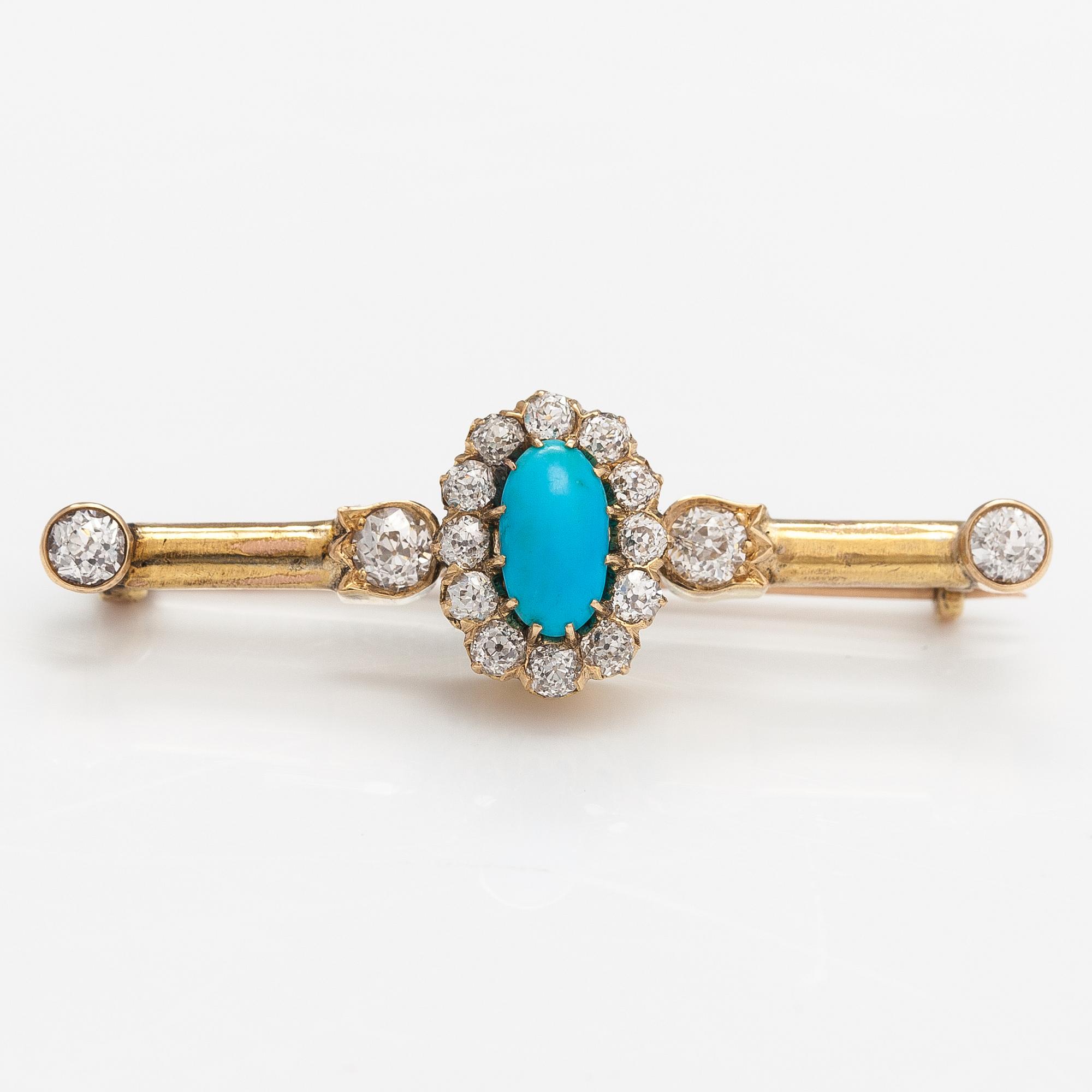 Brosch, 18K och 14K guld, turkos ca 0.95 ct och gammaslipade diamanter ca 0.95 ct tot.