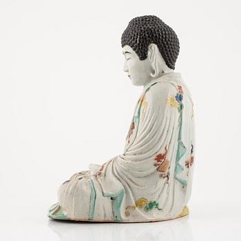 A porcelain buddha, Japan, 20th century.