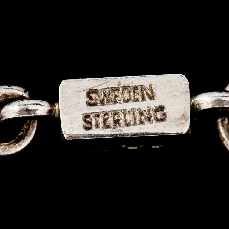 ARMLÄNK, sterlingsilver, Wiwen Nilsson, Lund, 1961. Vikt 19,1 g.