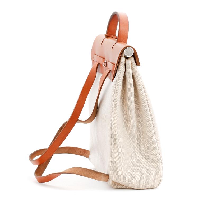 HERMÈS, a toil and vache fjord naturell "Herbag" handbag / backpack in two parts.