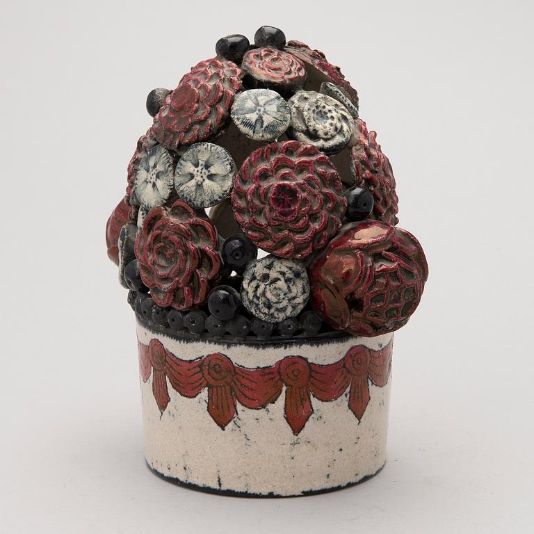 A stoneware sculpture, signed Kaipiainen Arabia.