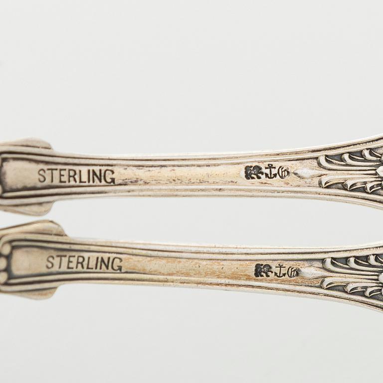 Black Starr & Frost, a pair of sterling silver shakers and sugar bowls, USA around 1900, Gorham pair of sterling spoons.