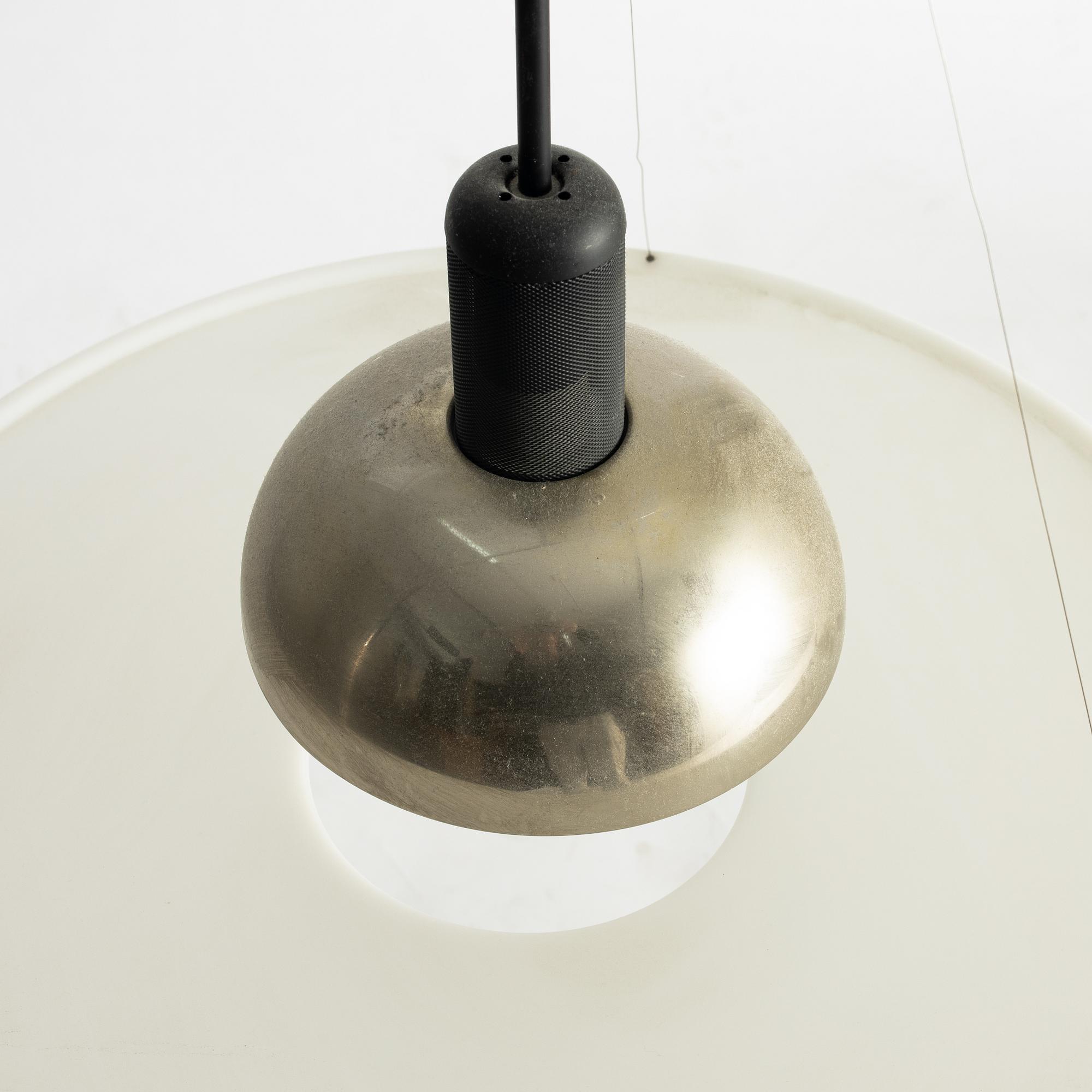 Achille Castiglioni, a pair of "Frisbi" ceiling lights, Flos, Italy.