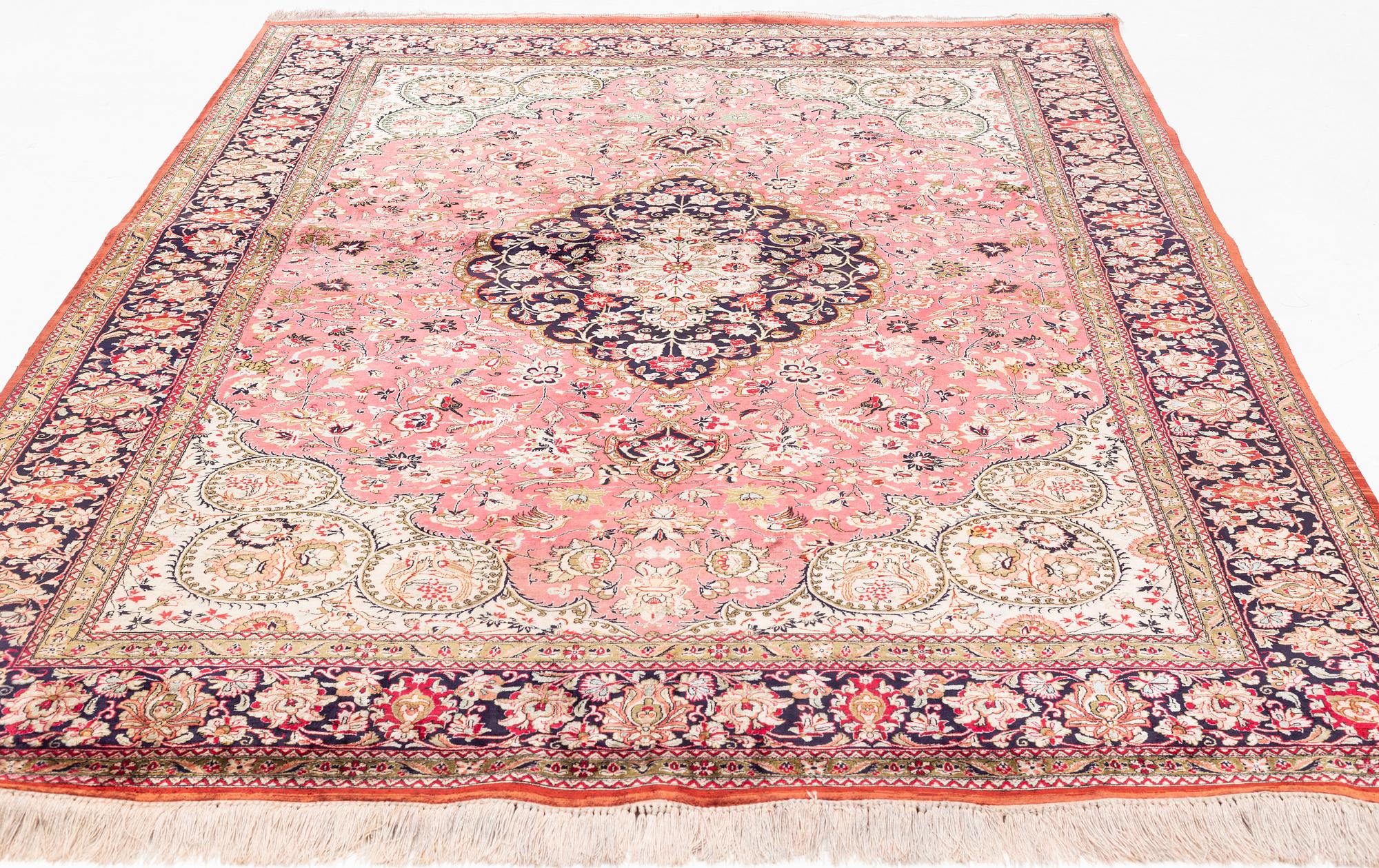 A Carpet, Silk Gohm, circa  298 x 202 cm.