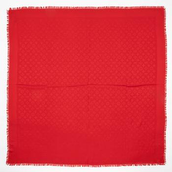 LOUIS VUITTON, a red monogrammed wool and silk shawl.