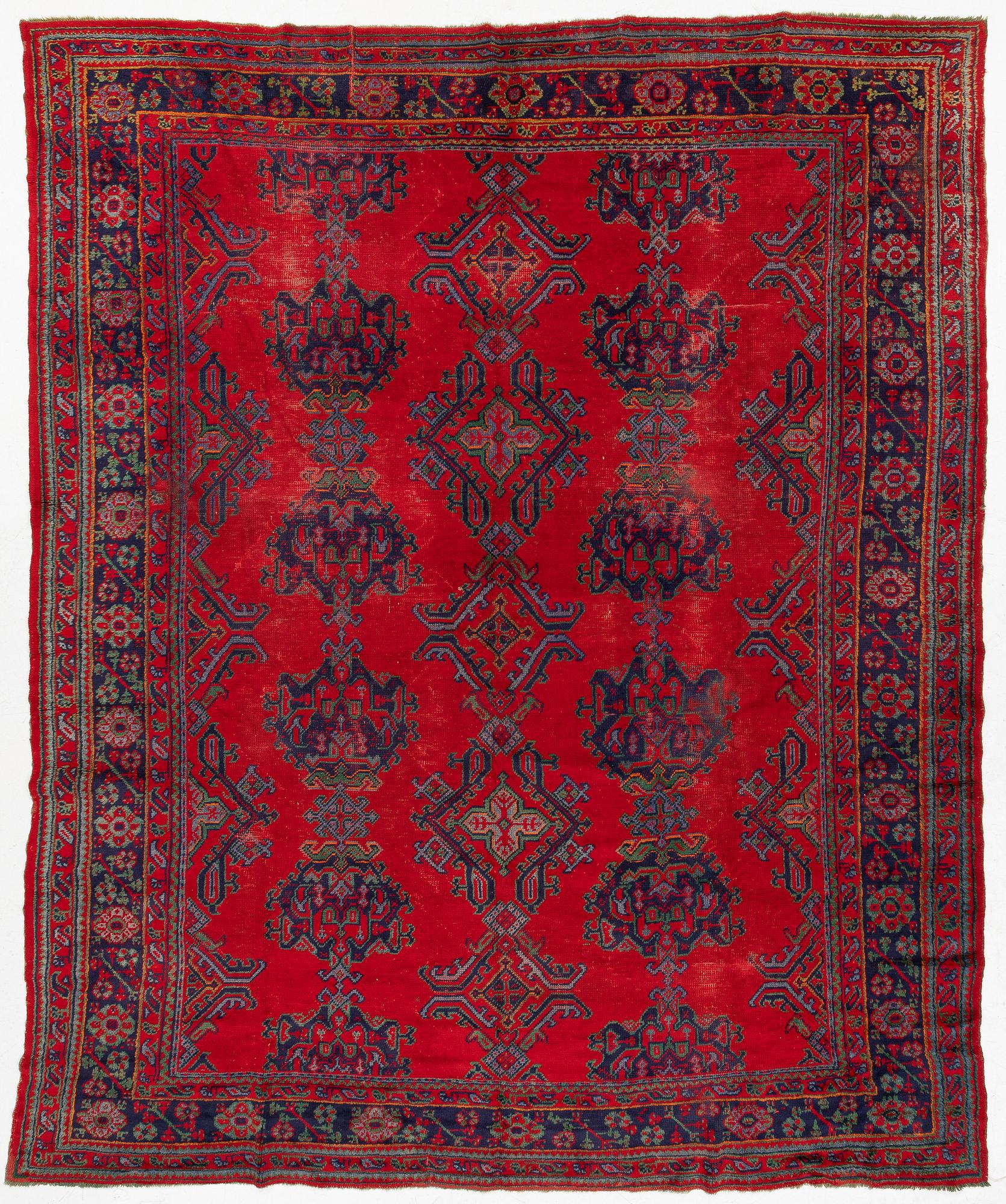 An antique Ushak carpet, Western Anatolia, approx. 380 x 313 cm.