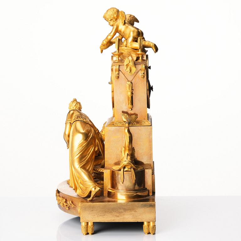 An Empire ormolu mantel clock 'La fontaine de l'Amour', early 19th century.