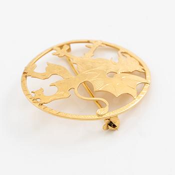 Brosch 18K guld.