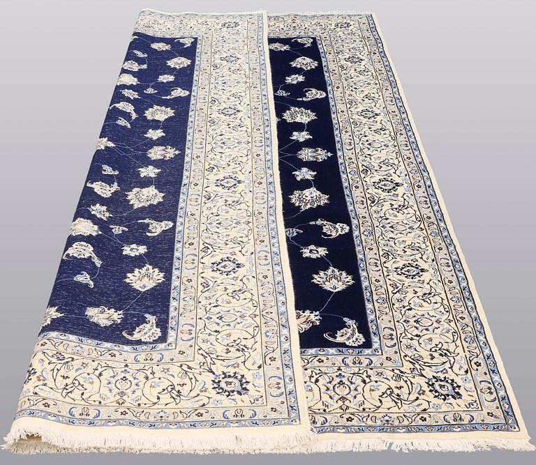 A carpet, Nain part silk s.k 9LAA, ca 312 x 199 cm.