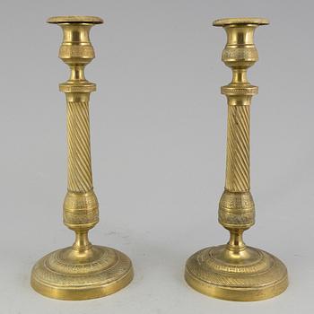 A pair of 'Empire' candlesticks, probably French.