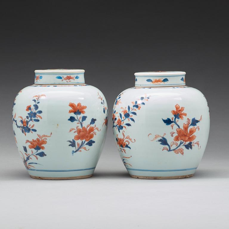 A pair of imari jars with covers, Qing dynasty, 18th Century.