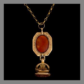 A PENDANT, 18K gold, carnelian. A.G. Roos, Turku. Early 19th century. Chain 14K gold. Weight totally c. 31.2 g.