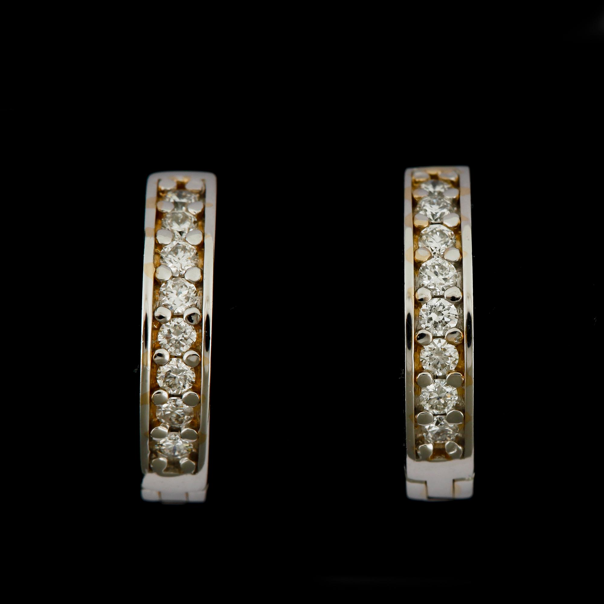 ÖRHÄNGEN, ett par, 14k vitguld med briljantslipade diamanter tot ca0,25ct. Vikt 2,9g.